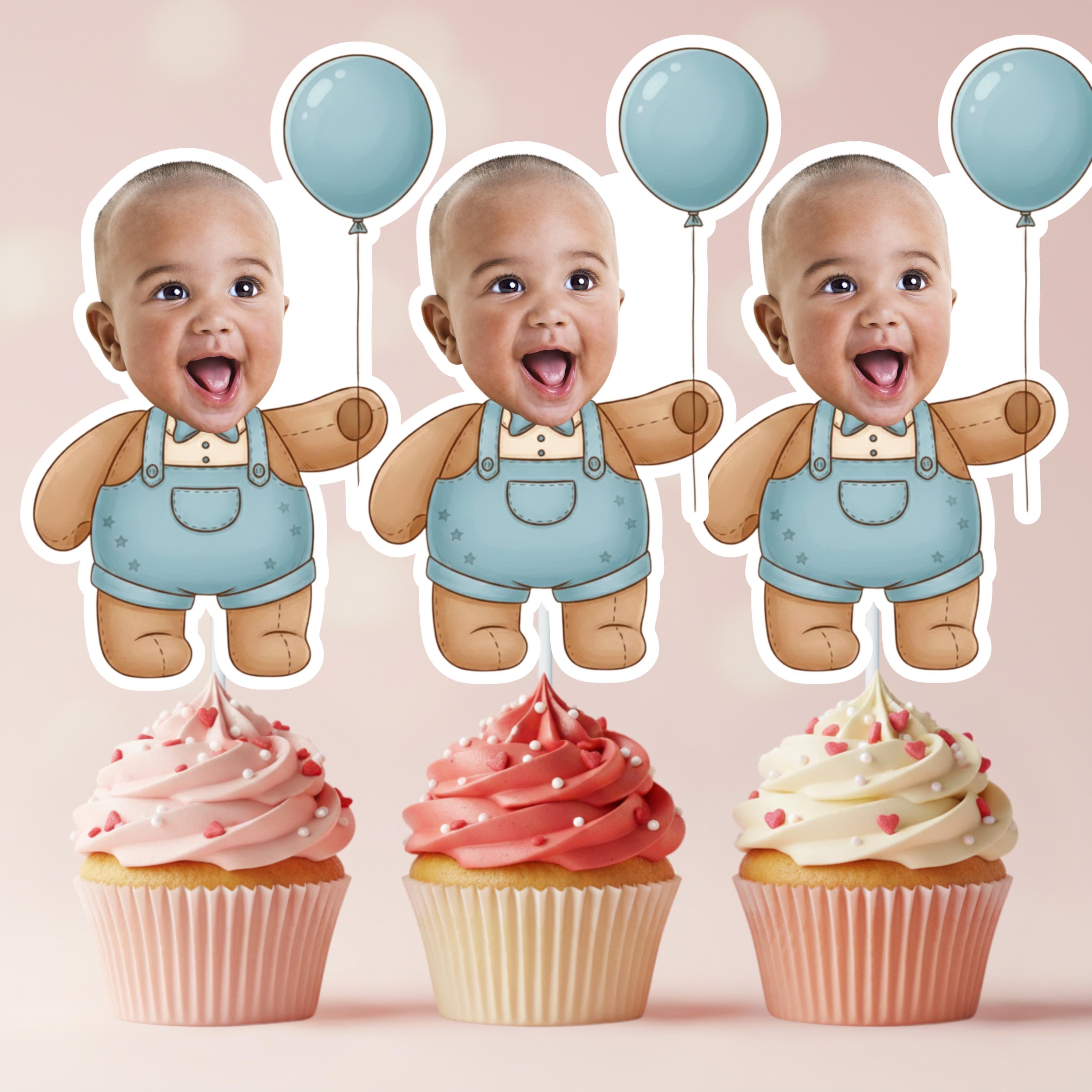 Three baby figures in blue overalls with balloons above, each accompanied by a cupcake on a pink background.