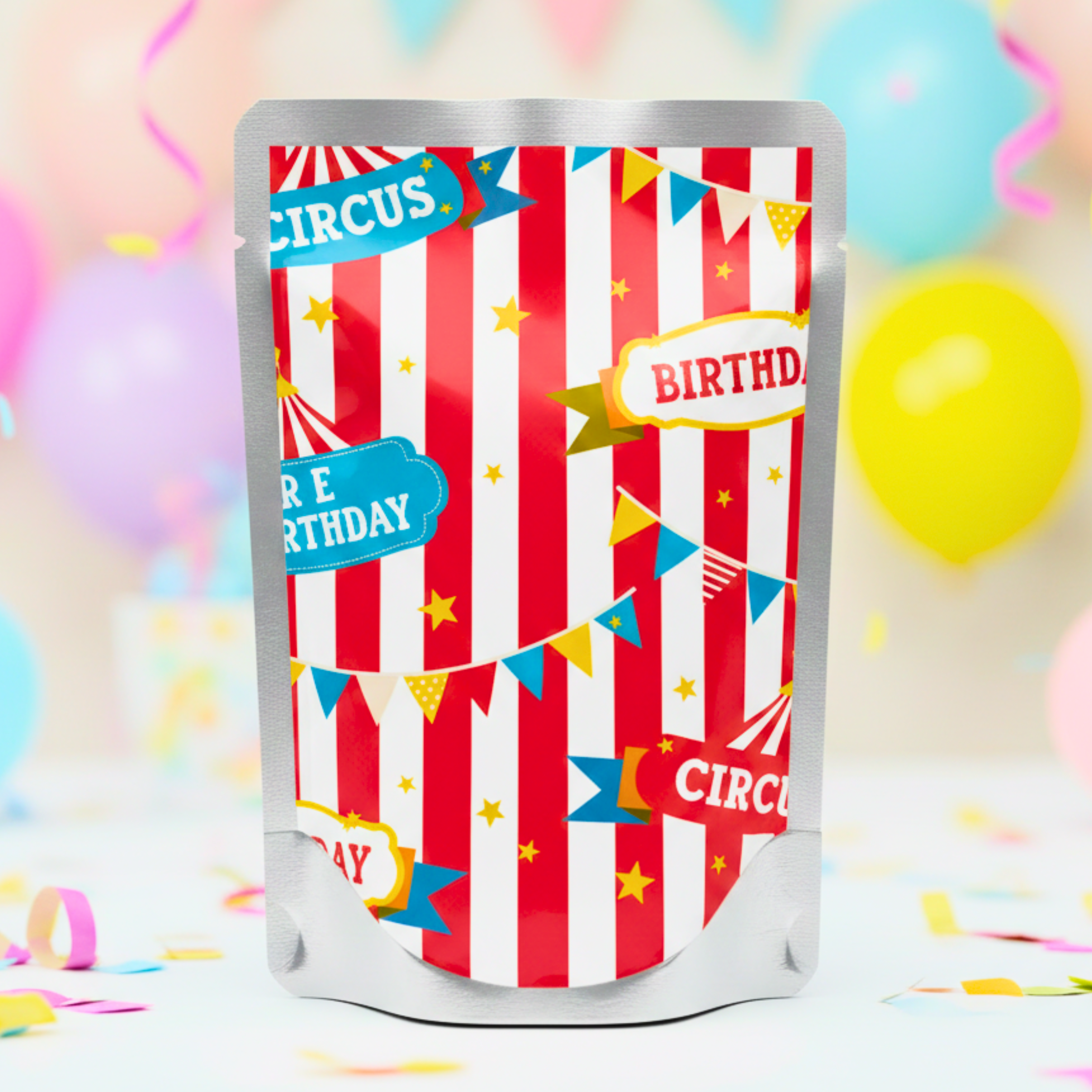 Circus-themed birthday party favor bag with colorful decorations on a festive background.
