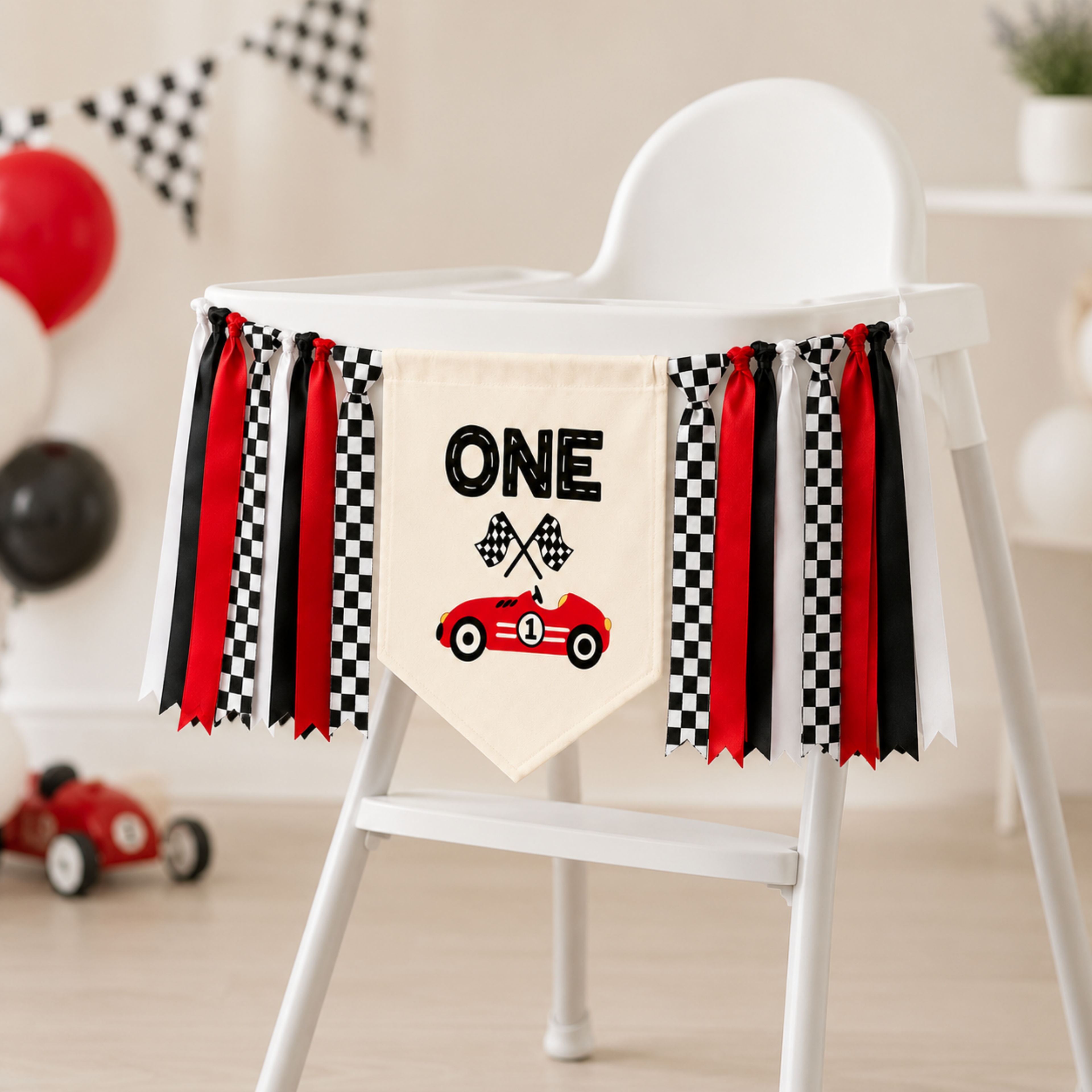 Personalized race car highchair banner displayed on a white highchair with checkered flag ribbons, perfect for Fast One, Formula WON, race day, Grand Prix, speedway, and vintage race car first birthday decor.