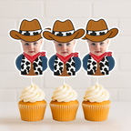 Trio of personalized cowboy baby photo cupcake toppers featuring infant wearing brown cowboy hat and red bandana, styled on vanilla cupcakes with white frosting. Perfect for wild west birthday parties, cowboy first birthday celebrations, rodeo baby showers, and western dessert table setups. Custom child face cupcake decorations for country themed milestone events.