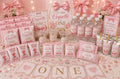 Luxury custom coquette birthday party favor bundle package featuring personalized chip bags, water bottle labels, ring pop wrappers, fruit snacks, rice krispie treats, party banner, coloring books, stickers, cupcake toppers, cake topper, and custom birthday decorations for girls first birthday parties