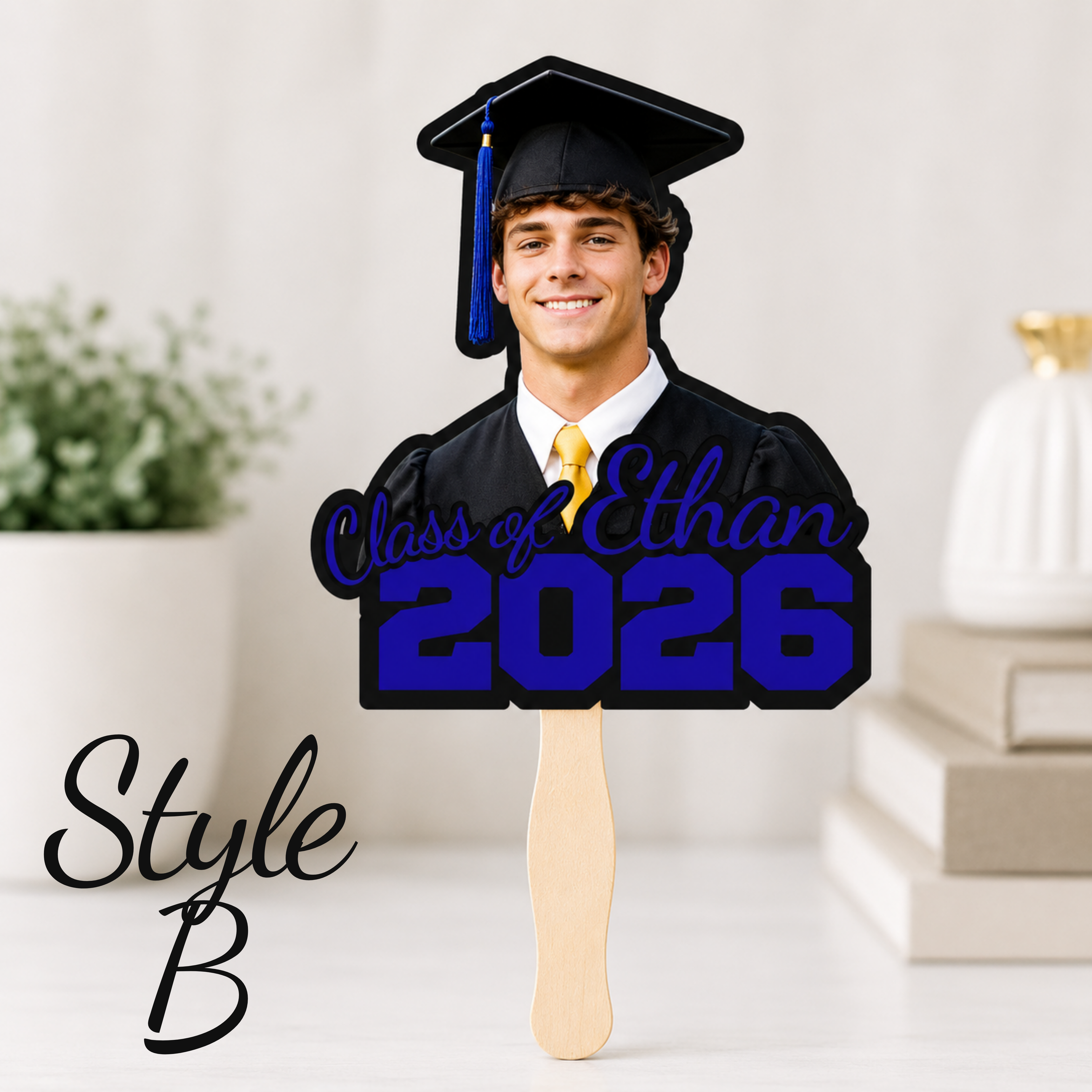 Blue personalized graduation fan featuring a custom senior photo, Class of 2026 design, and graduate name. Modern graduation cheering fan perfect for graduation ceremonies, senior celebrations, and graduation party decor. Graduation-themed standee with 'Class of Ethan 2026' text on a white background