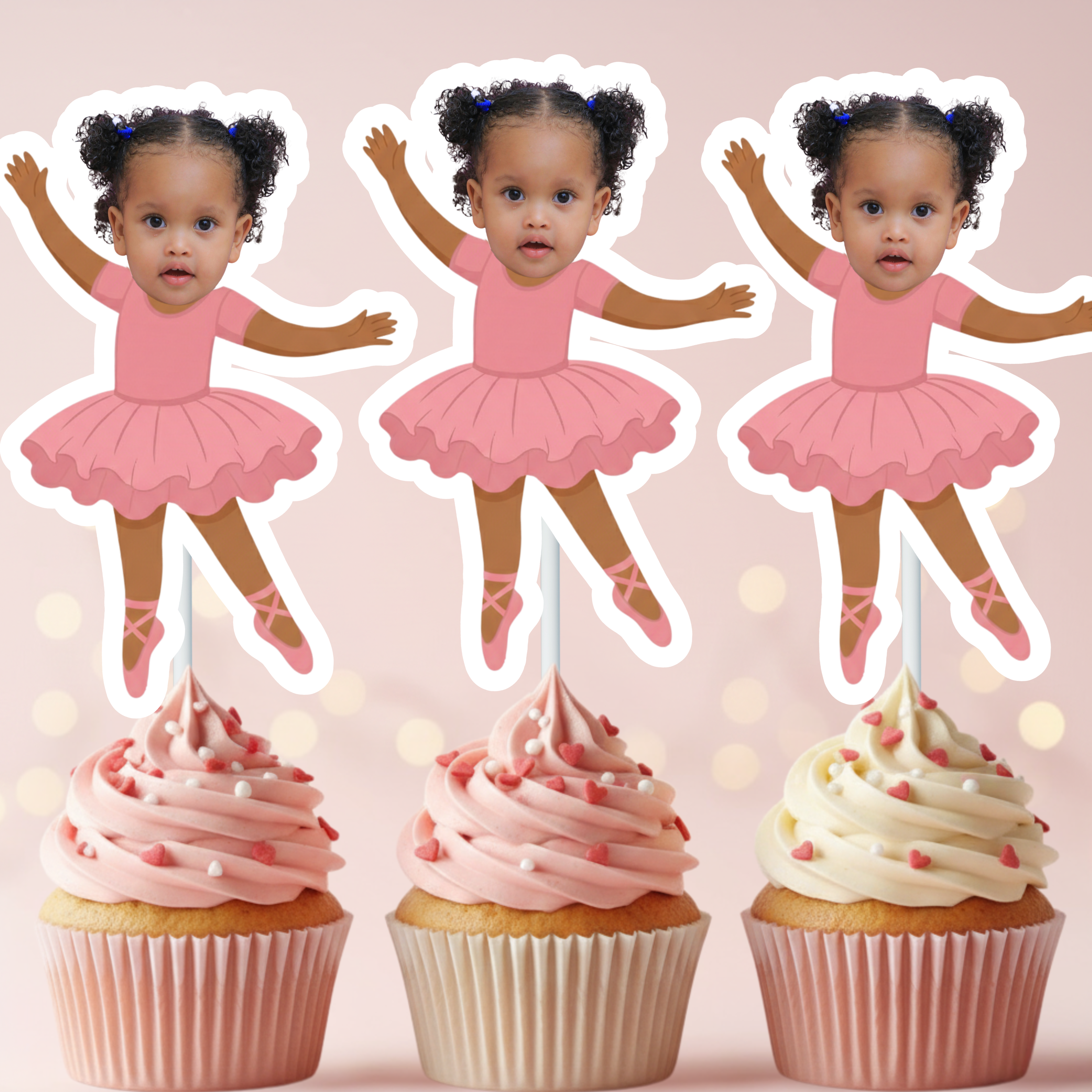 Three cupcake toppers with a ballerina design on a pink background