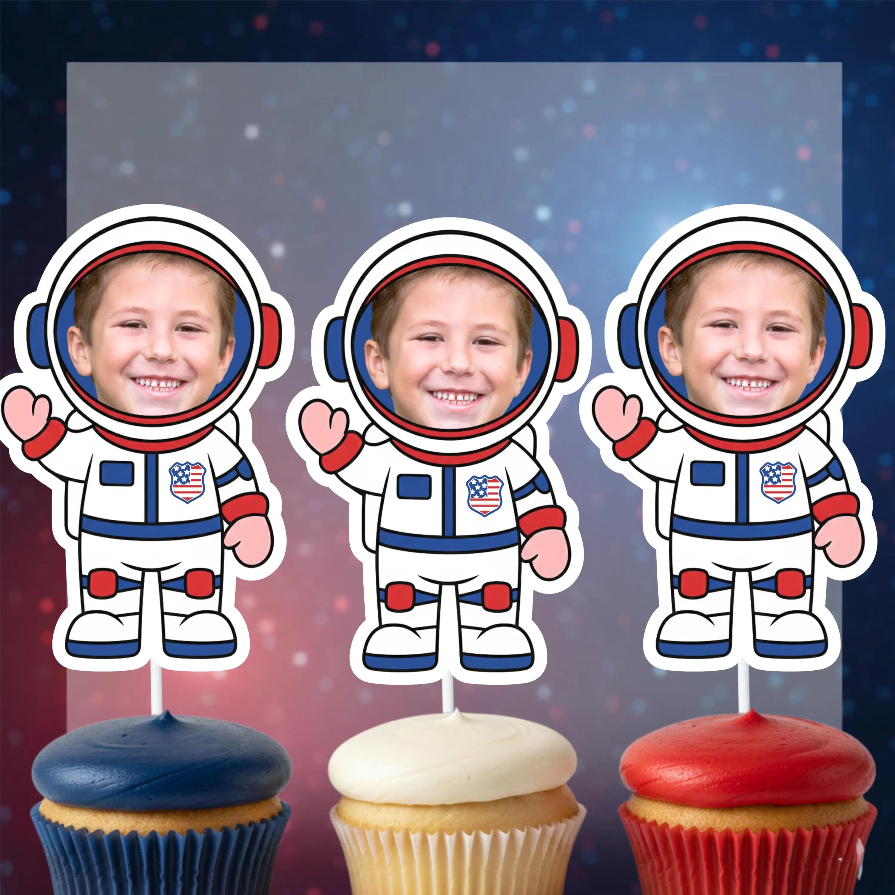 Three cupcakes with American U.S.A. astronaut-themed toppers against a space-themed background