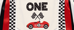 Close up of personalized Fast One race car highchair banner featuring premium DTF printed race car artwork, checkered flags, and vintage race car design for a first birthday cake smash and racing party decor.