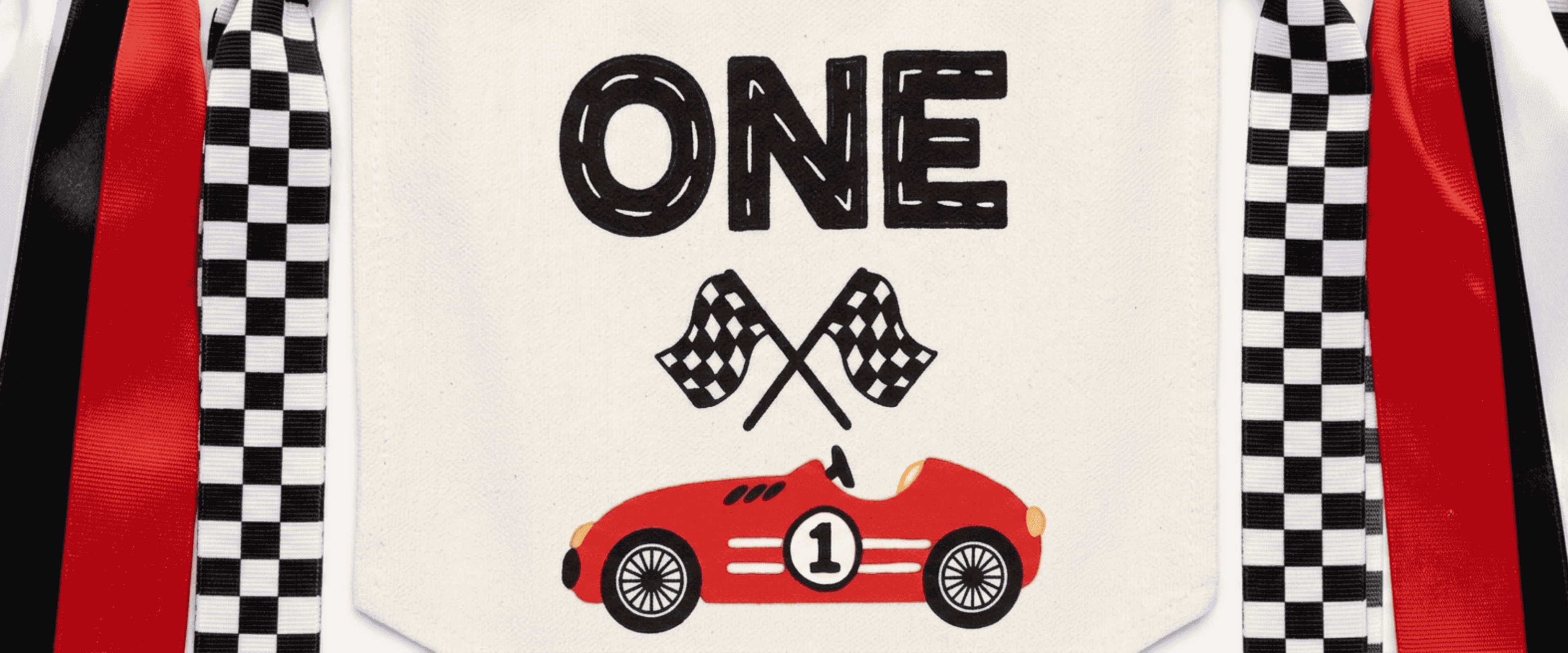 Close up of personalized Fast One race car highchair banner featuring premium DTF printed race car artwork, checkered flags, and vintage race car design for a first birthday cake smash and racing party decor.