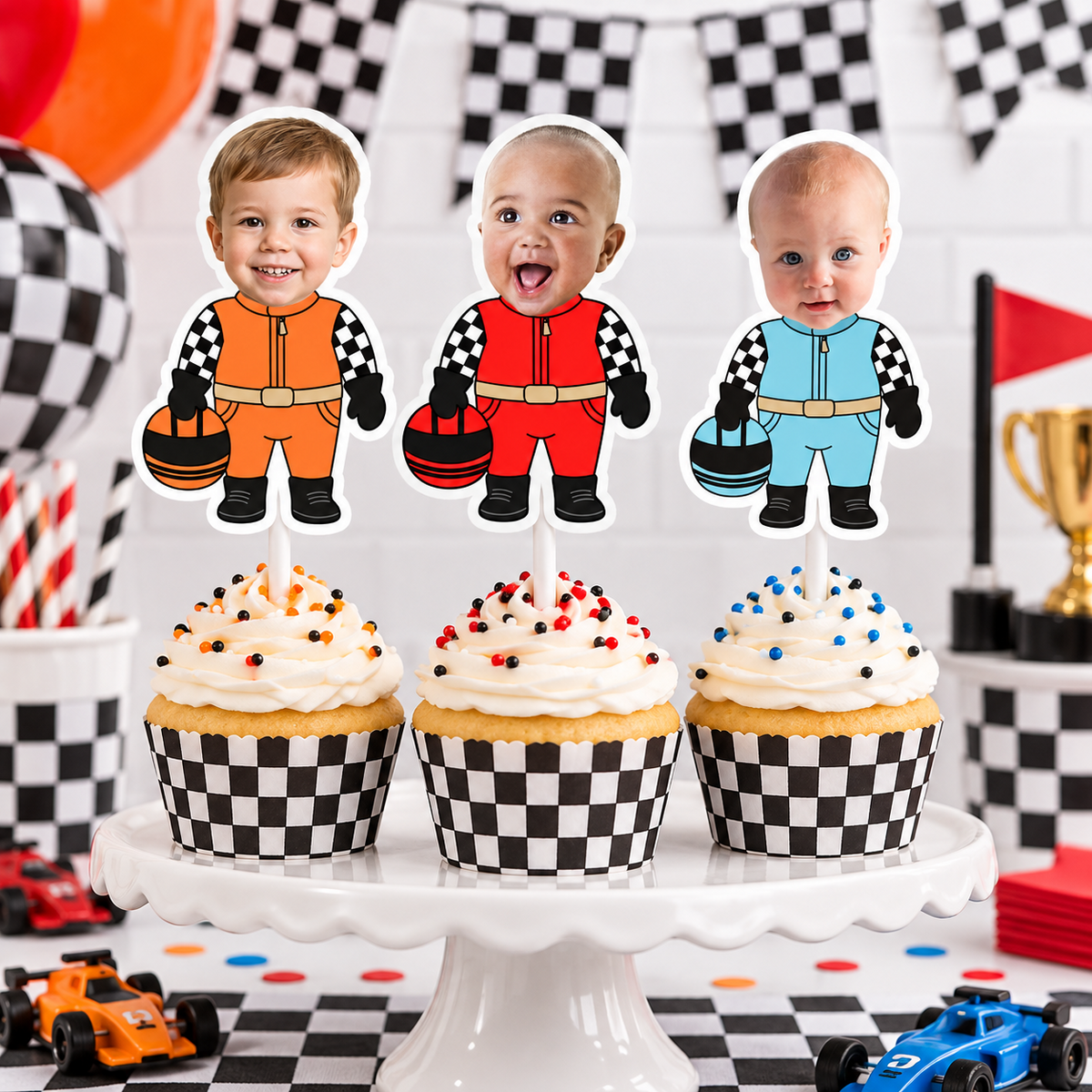 Fast One birthday cupcake display featuring personalized child photo race car driver toppers in orange red and blue