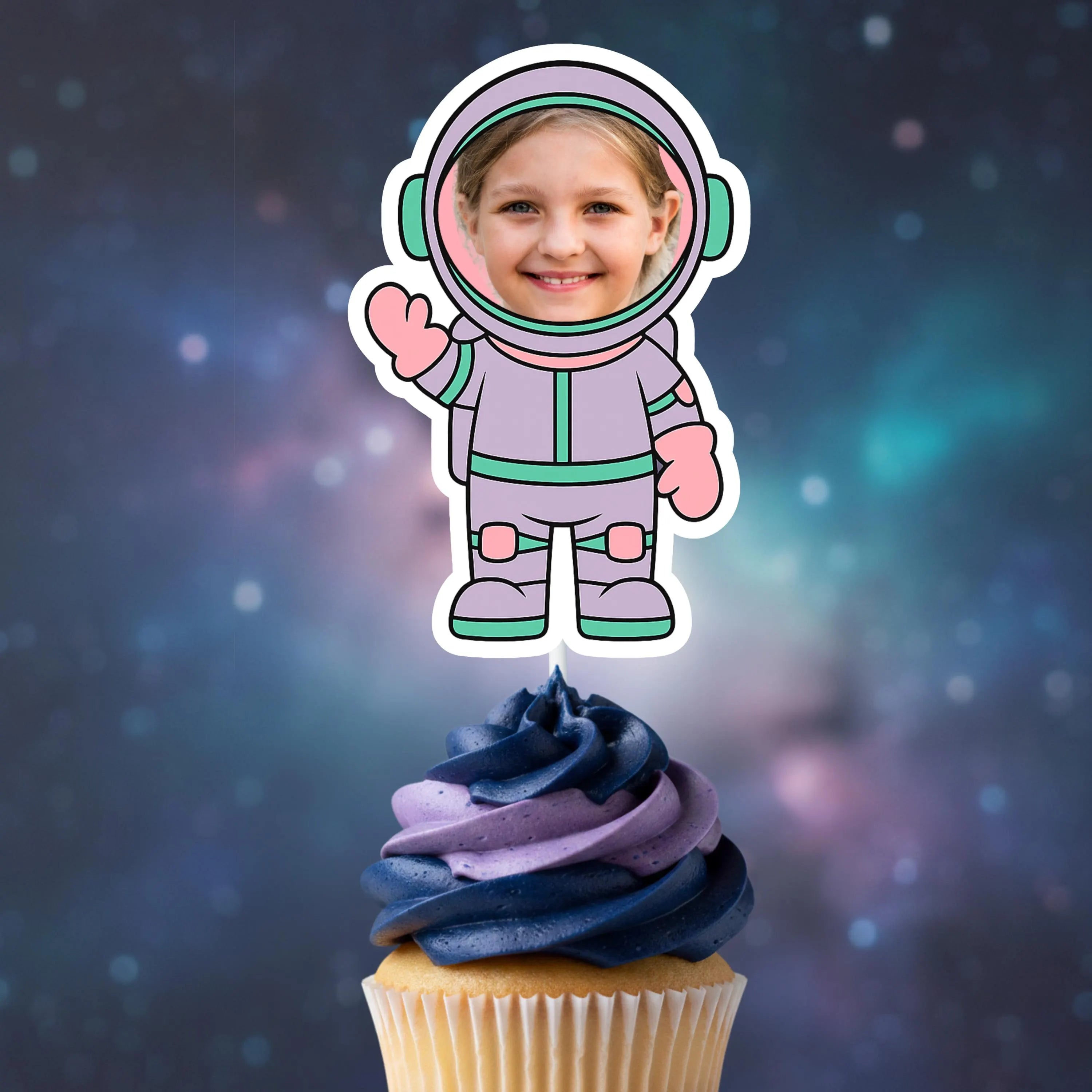 Cupcake with an astronaut-themed topper against a starry space background