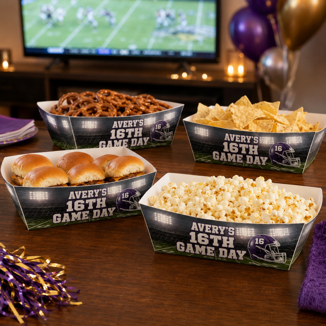 Purple and gold personalized football food trays filled with sliders, pretzels, tortilla chips and popcorn for Avery’s 16th Game Day birthday.