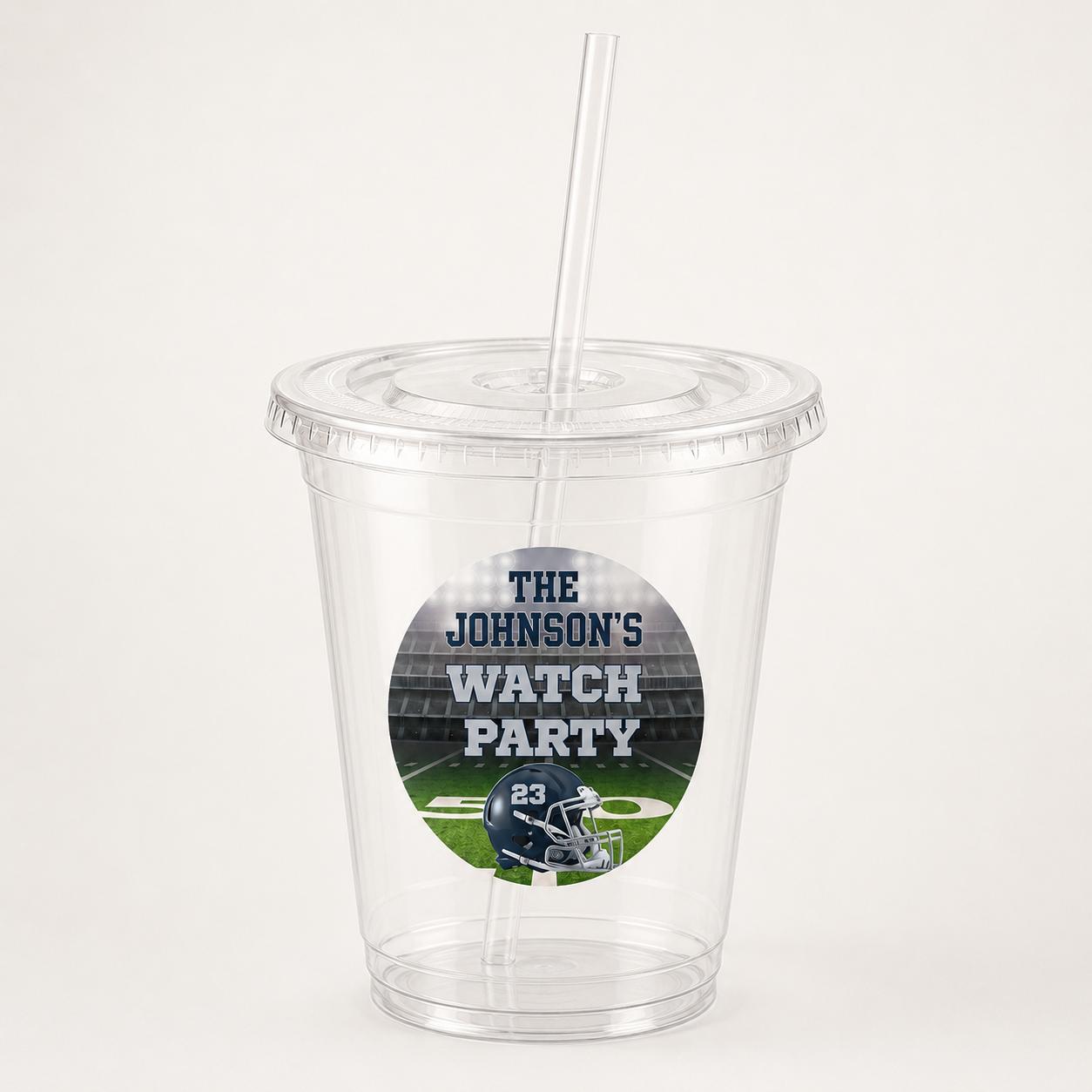 Personalized 16 oz clear football cup with fitted lid straw and custom circular game day sticker