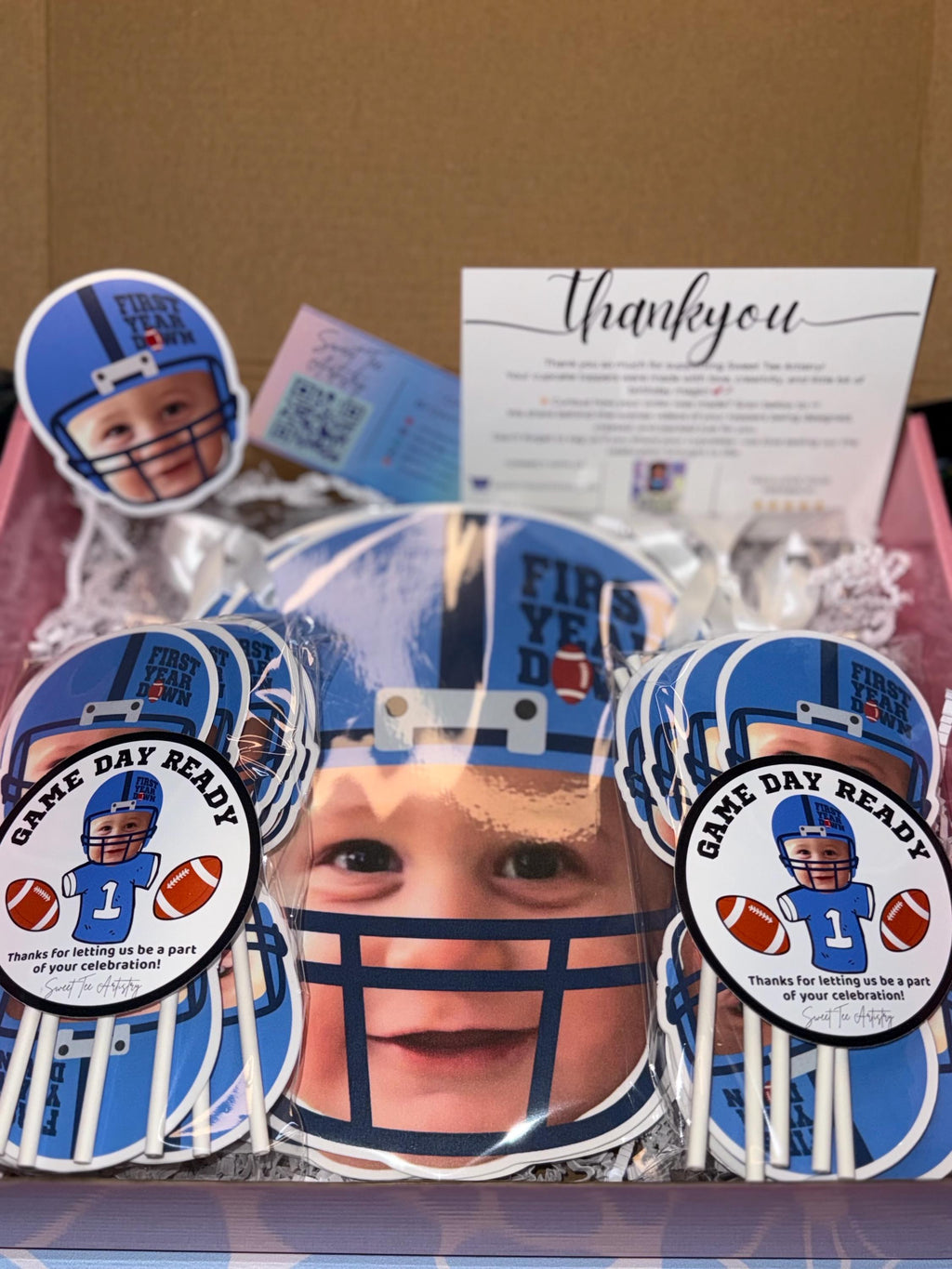 Personalized Football First Year Down cupcake toppers carefully packaged in gift-ready presentation box with protective wrap and thank you card. Custom photo football 1st birthday party decorations securely prepared for shipping to ensure safe arrival for sports themed baby birthday celebration.