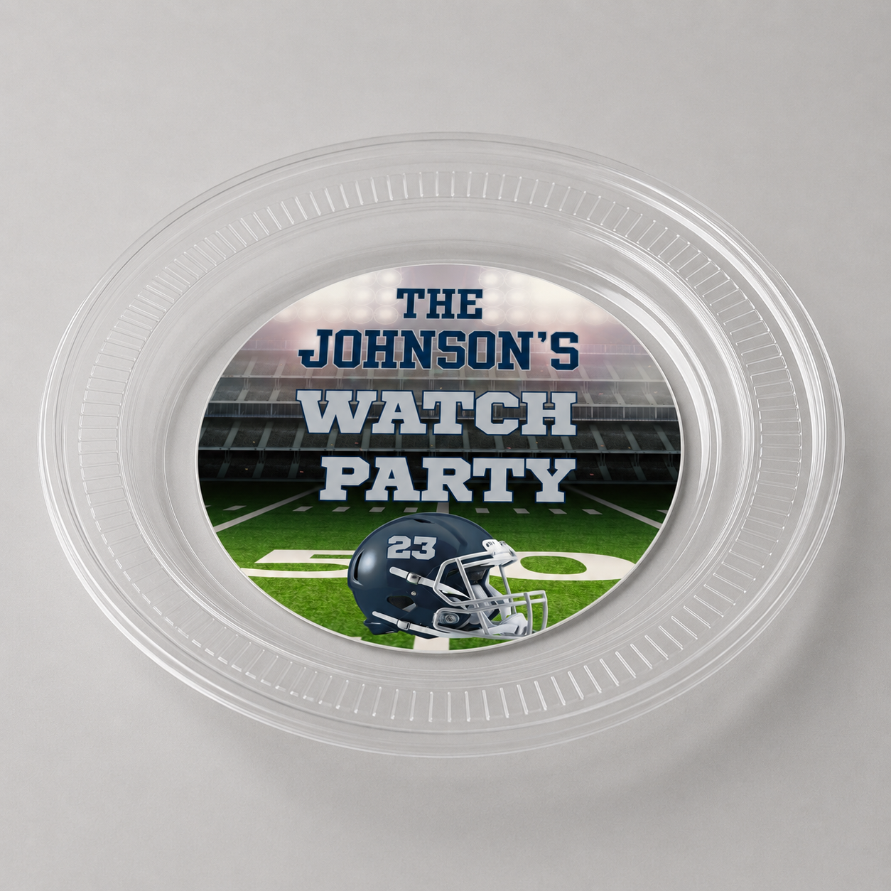 Personalized 7 inch clear football party plate with custom center design wording colors and helmet number