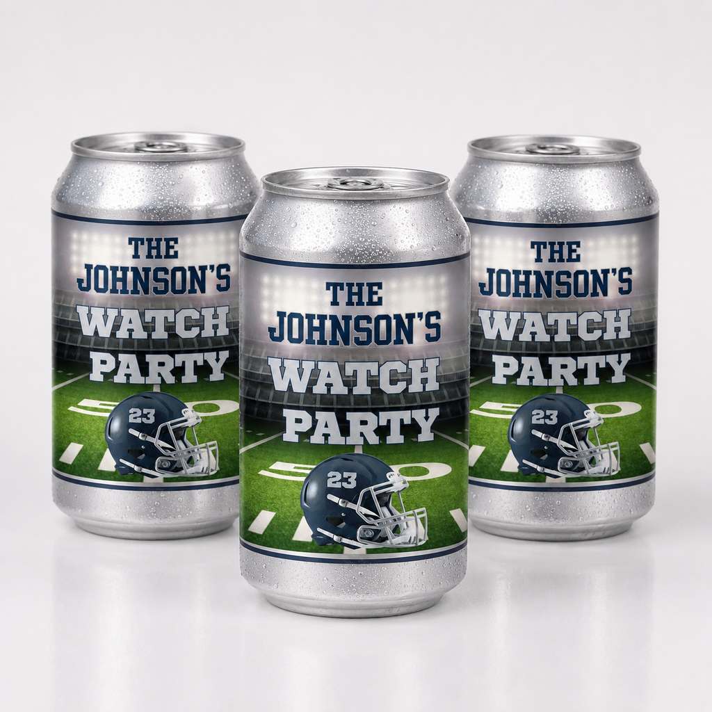 Three silver aluminum beverage cans with custom printed designs, featuring the text 'THE JOHNSON'S WATCH PARTY' over a football field background with a navy helmet graphic, arranged on a light gray reflective surface.