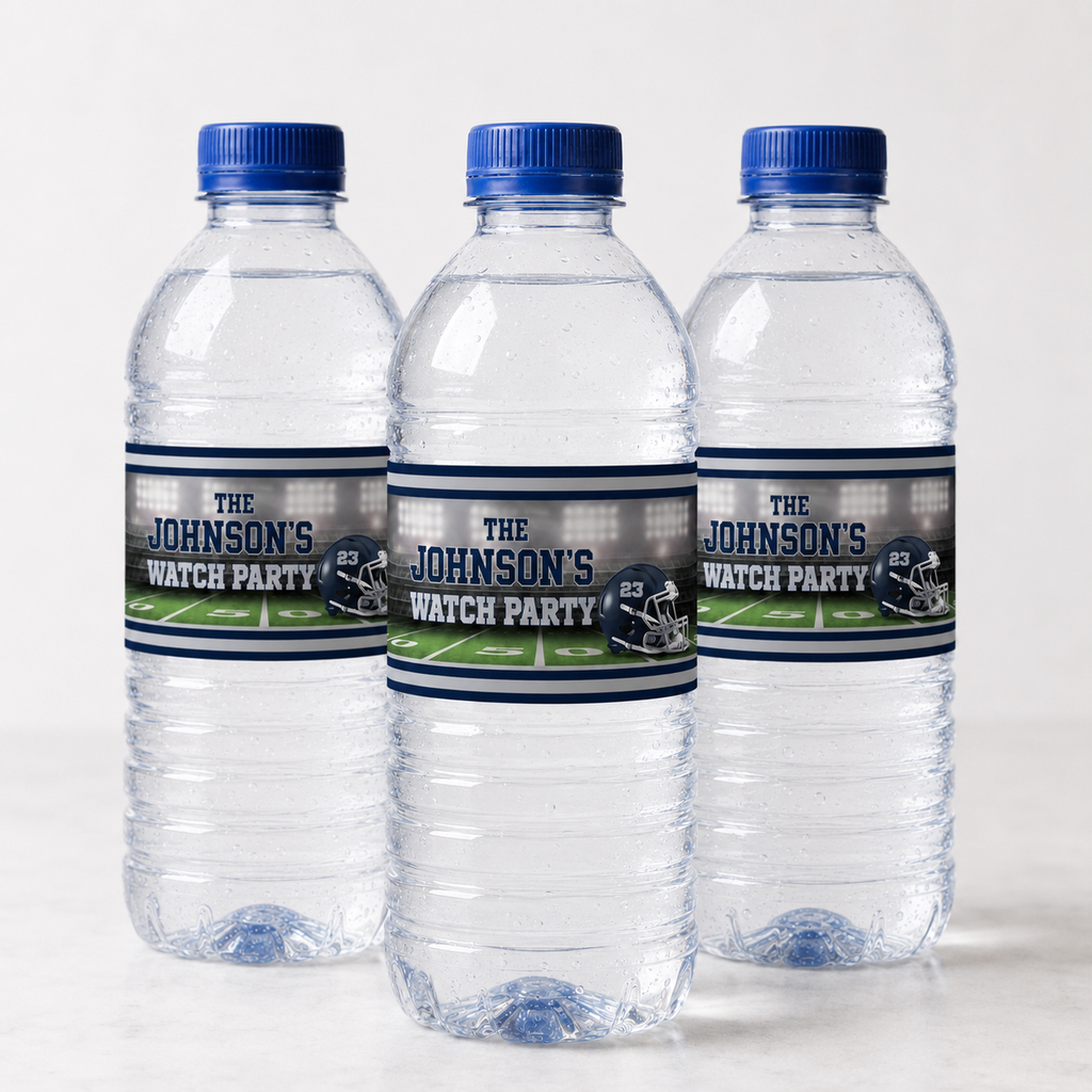 Three standard water bottles featuring personalized navy and silver football party labels with a stadium design and helmet number 23.