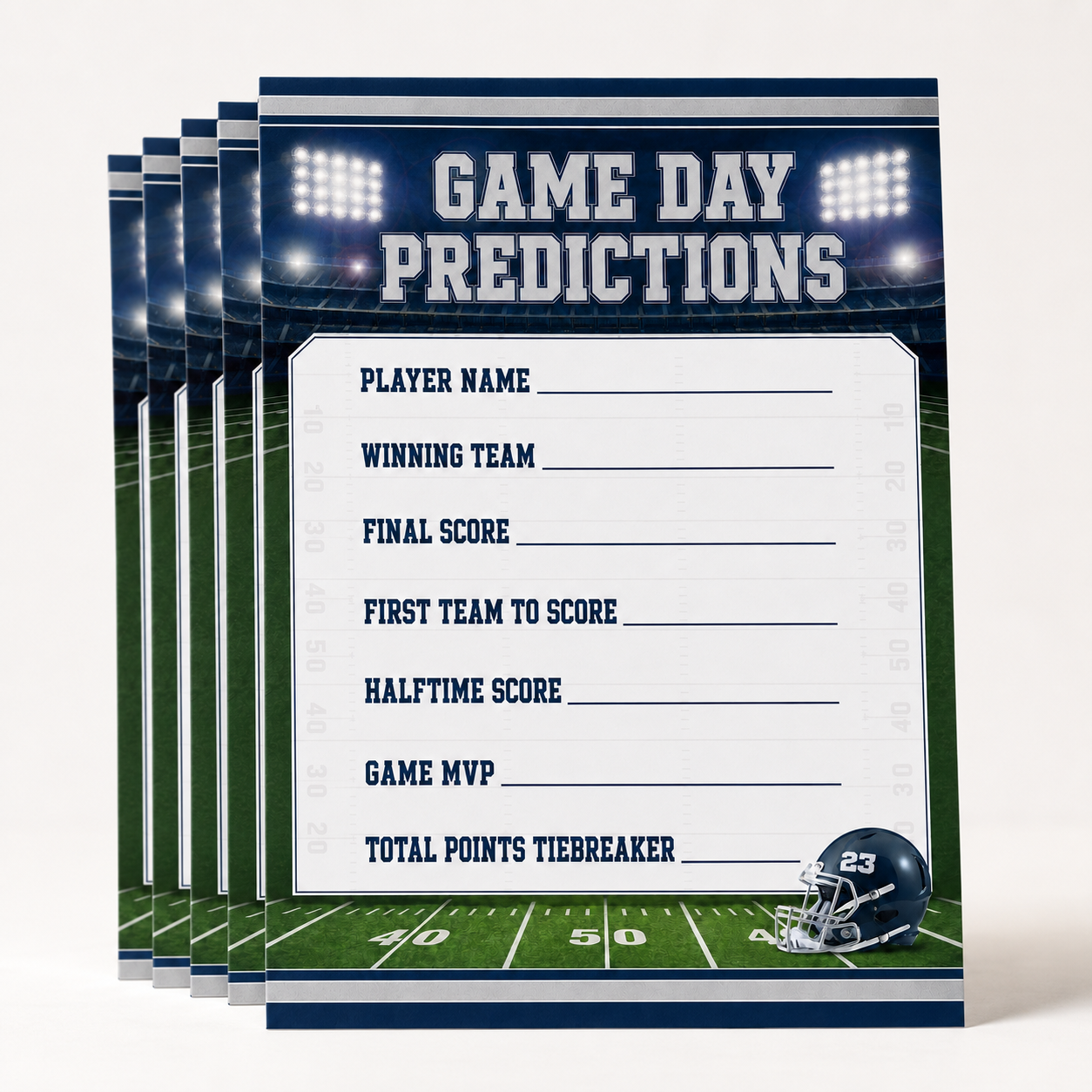 A stack of football-themed game day predictions cards shown on a light gray background. The top card features a white writing area with fields for player name, winning team, final score, first team to score, halftime score, game MVP, and total points tiebreaker, framed by a dark blue stadium and field graphic with a helmet illustration.