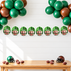 Personalized First Year Down football photo banner featuring eight child face panels in green football helmets displayed with green and brown balloons for a football first birthday party