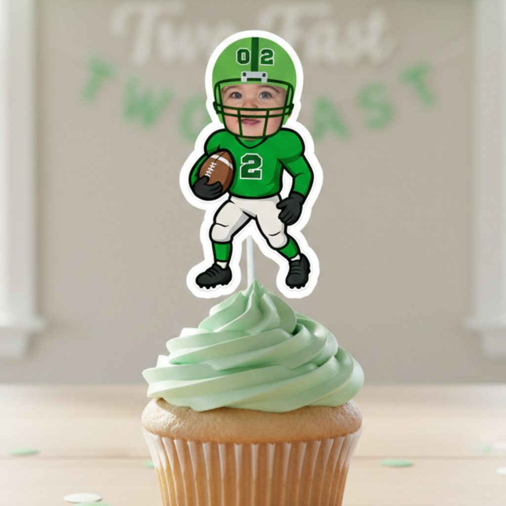 Three personalized football cupcake toppers featuring a custom photo face and green jersey with the number 2, displayed on vanilla cupcakes with green frosting for a toddler football birthday party. These age 2 sports themed dessert decorations are perfect for a second birthday celebration, game day party theme, or youth football inspired baby milestone event. Custom face sports party supplies designed for little athletes turning two.