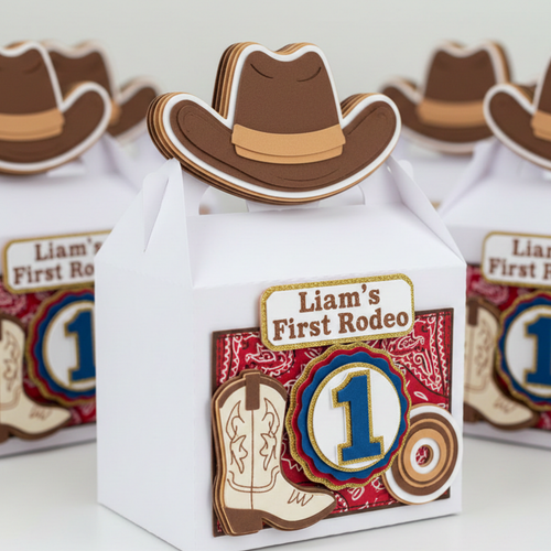 Gift box with cowboy hat design and 'Liam's First Rodeo' text on a white background