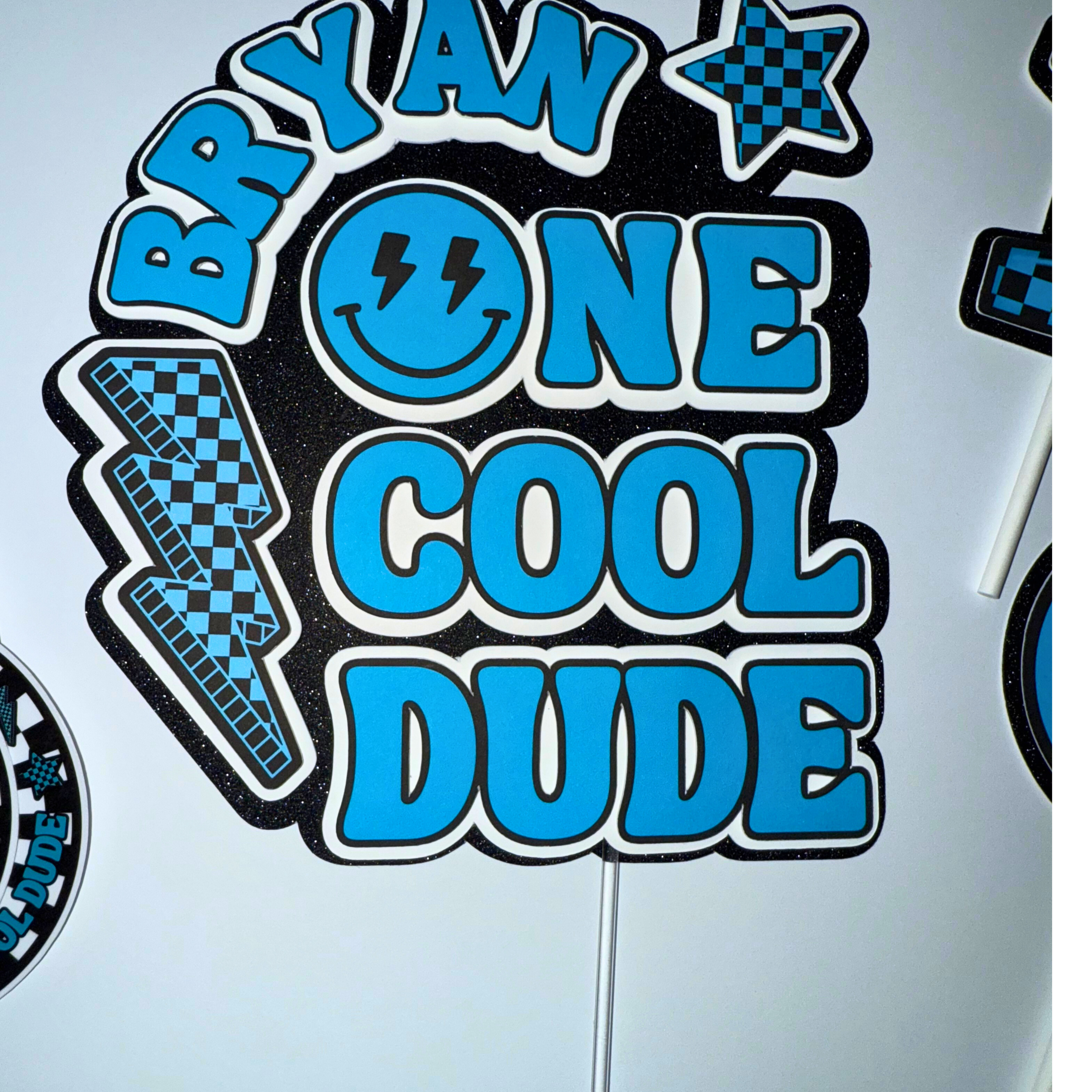 Single Layered Blue and black decorative text and graphics on a light blue background