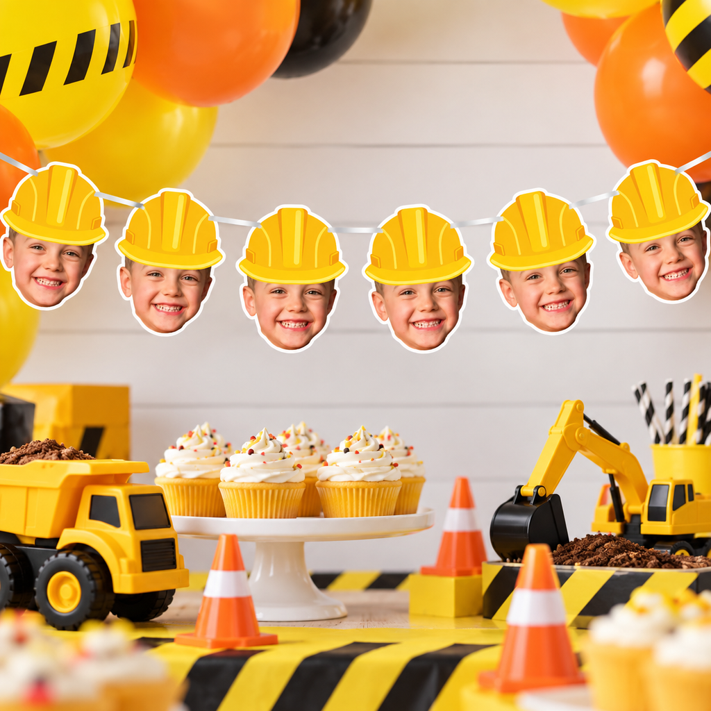 Personalized construction photo banner featuring a childs face in a yellow hard hat displayed above a construction birthday dessert table with balloons dump trucks and cupcakes