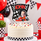 Personalized race car birthday cake topper with child photo name and age displayed on a racing themed birthday cake with red black and checkered party decor
