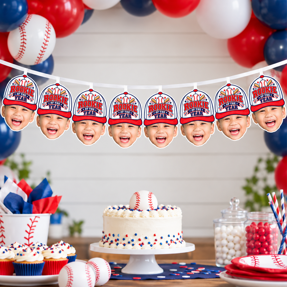 Personalized Rookie of the Year baseball photo banner displayed above a red white and blue baseball birthday dessert table