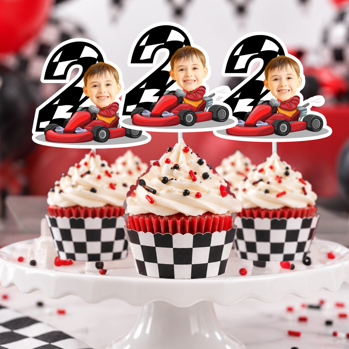 Custom race car photo cupcake toppers with age two displayed on cupcakes for a second birthday racing party