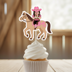 Single personalized cowgirl horse cupcake topper featuring a smiling child photo in a pink western outfit riding a brown pony, styled on a frosted cupcake for a rodeo themed birthday party. This custom western cupcake decoration is perfect for cowgirl birthdays, first rodeo celebrations, country girl milestone parties, rustic barnyard themes, and pony themed birthday décor. Designed as a high quality photo cupcake pick, this cowgirl horse topper enhances western dessert tables and pink rodeo birthday. 