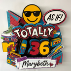 Handmade personalized Totally 90s birthday cake topper with bright pink blue yellow and black layered cardstock, custom name and age details.