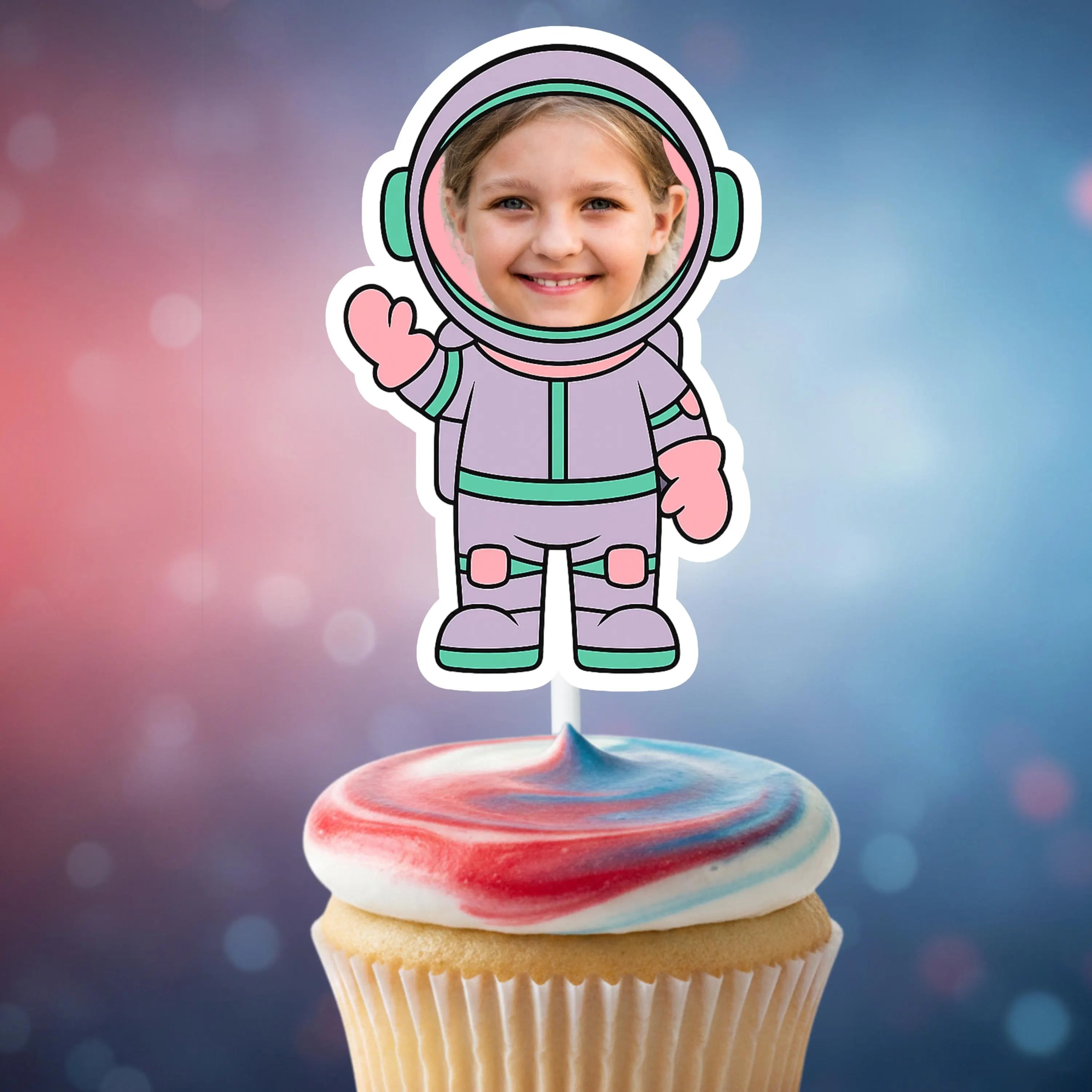Cupcake with a colorful frosting and an astronaut-themed cupcake topper against a starry background.