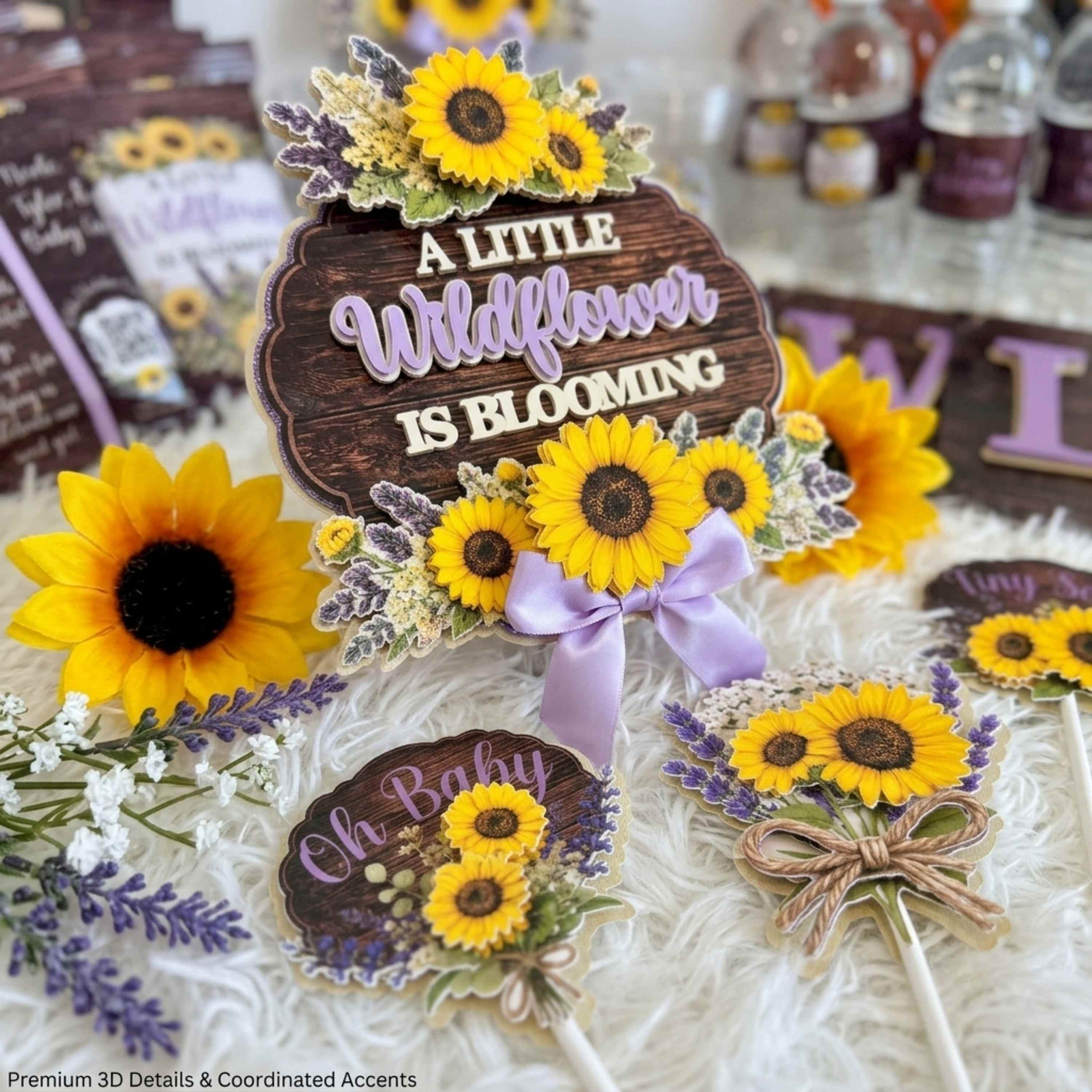 Premium layered baby shower cake topper with matching cupcake toppers featuring sunflower floral arrangement lavender accents rustic wood grain background dimensional handmade custom baby shower decorations