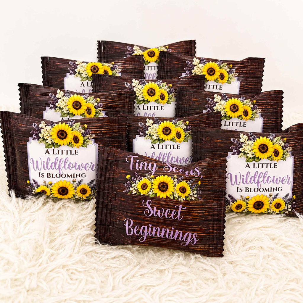 Custom rice krispie treat baby shower favors featuring sunflower wildflower design lavender floral accents dark rustic wood grain wrapper packaging personalized dessert favors for baby shower party decorations gender neutral celebration theme
