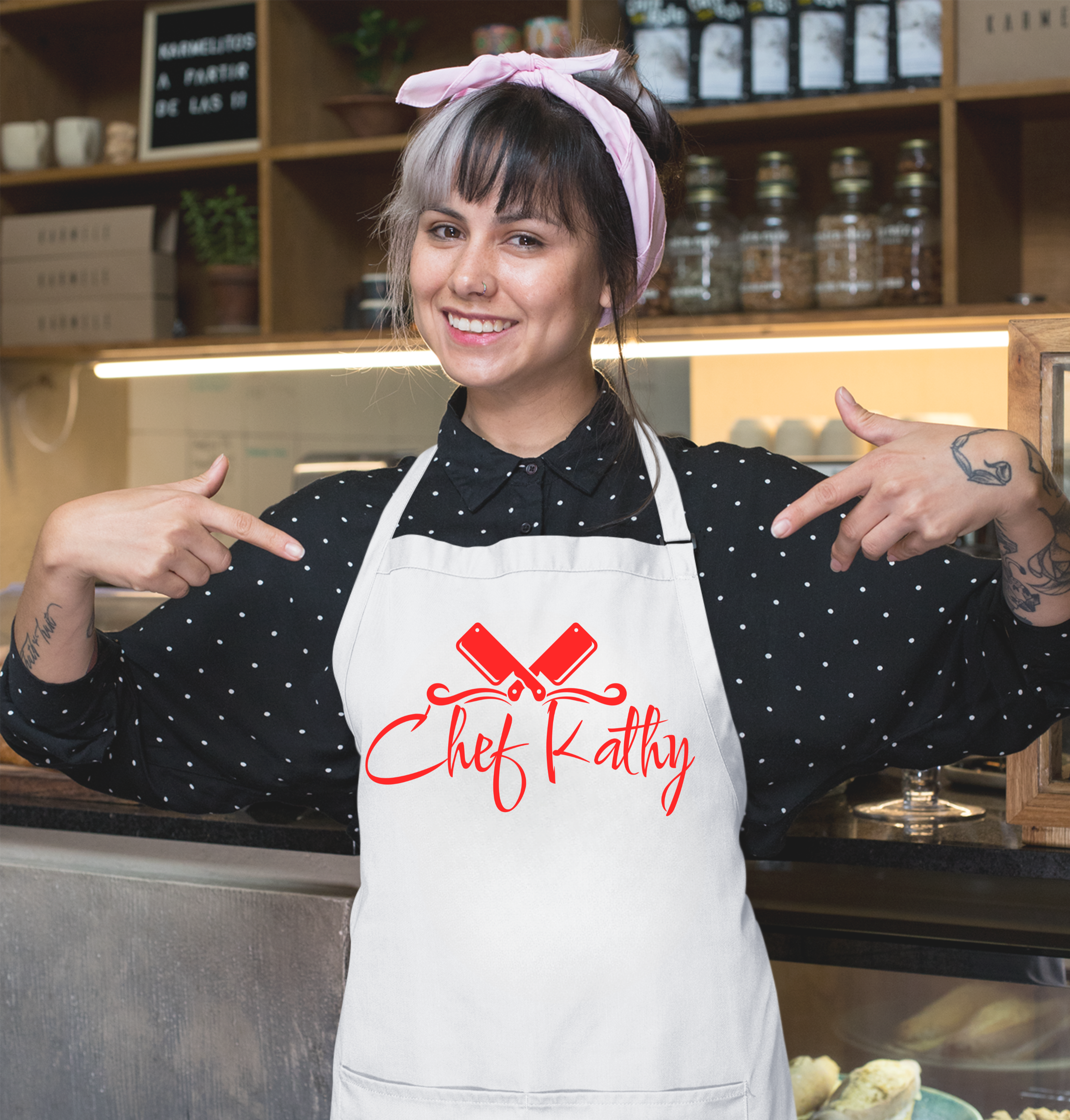 Person wearing a 'Chef Kathy' apron in a kitchen setting