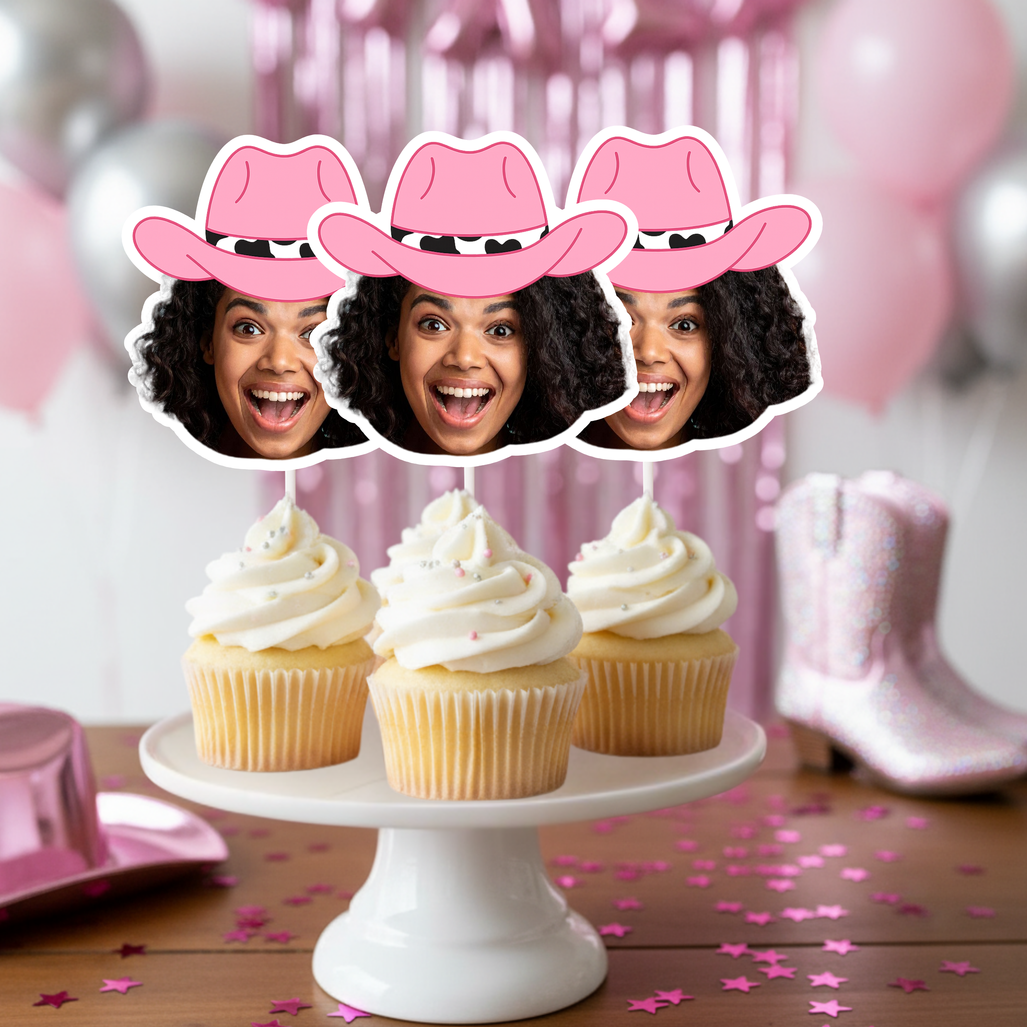 Adult woman birthday party photo cupcake toppers featuring custom face cutouts with pink cowgirl hats displayed on cupcakes, fun personalized dessert decorations for girls birthday celebration, western themed adult birthday party decor