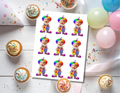 Personalized circus clown photo cupcake toppers showing Rainbow Afro Clown and Rainbow Pigtail Clown styles with child faces displayed on cupcakes for a colorful carnival birthday party