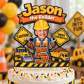 Personalized construction birthday cake topper with the name Jason and age 5 displayed on a white frosted birthday cake with construction party decorations in the background