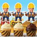Three personalized construction cupcake toppers displayed on cupcakes with vanilla and chocolate frosting in a bright construction themed party scene