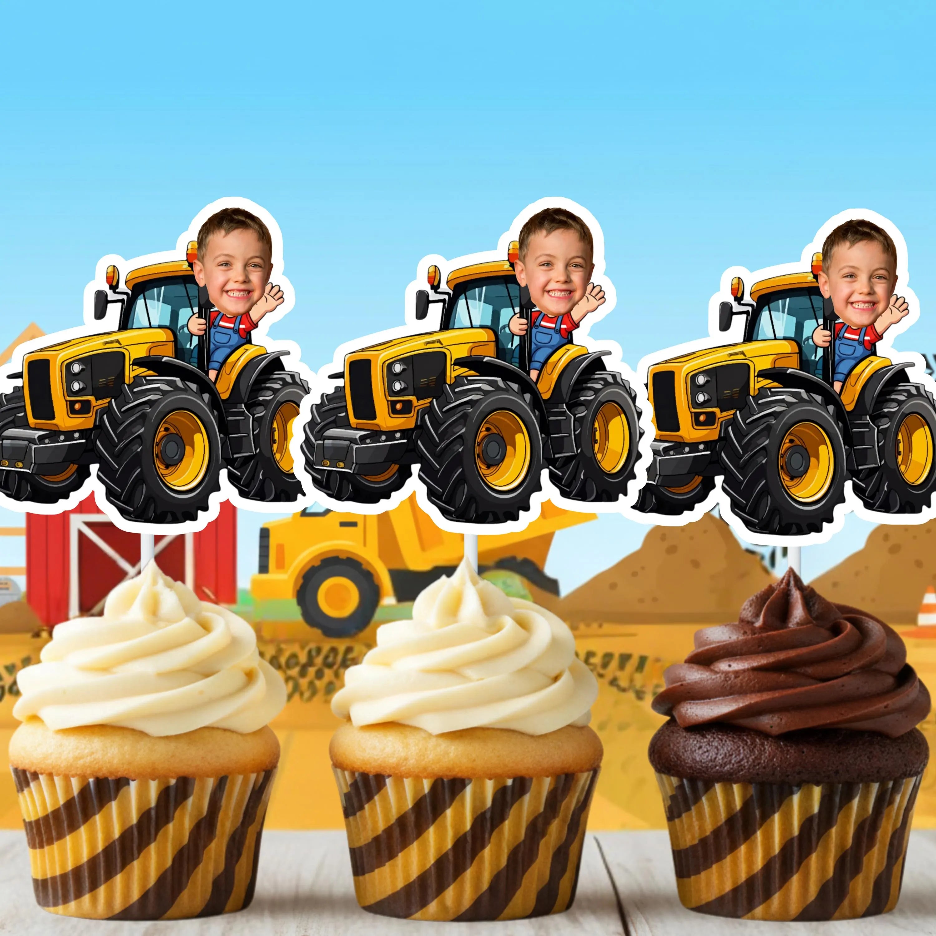 Custom tractor cupcake toppers with personalized child photos shown on mixed vanilla and chocolate cupcakes. Designed for construction birthday party themes, farm birthday decorations, and big wheels toddler birthday dessert tables.