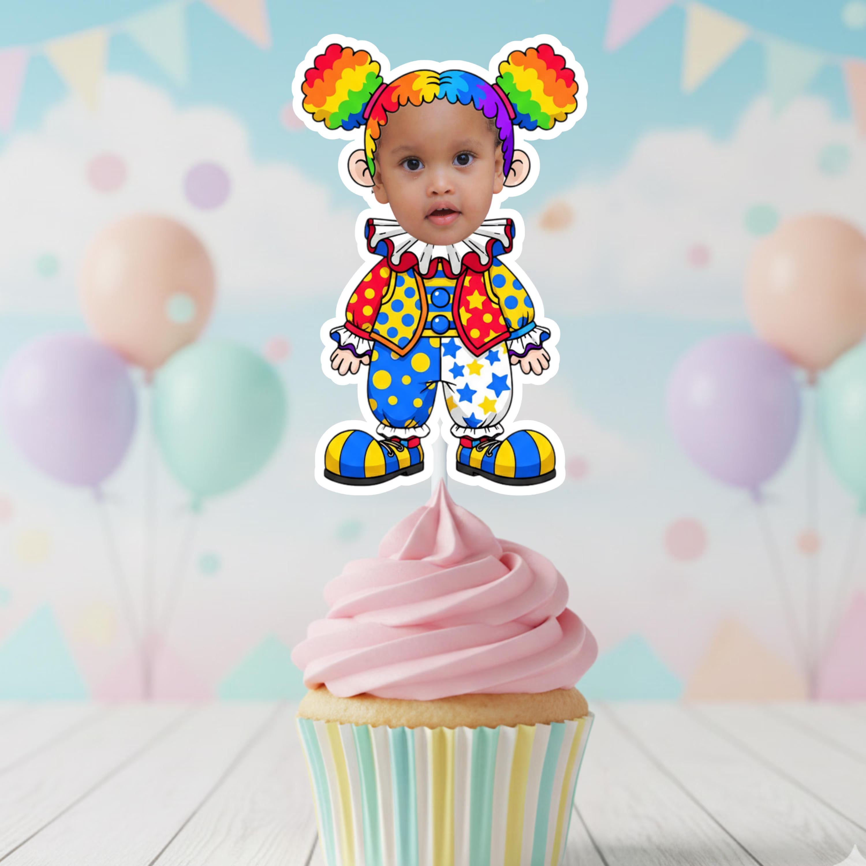 Cupcake with a clown-themed topper against a colorful balloon background