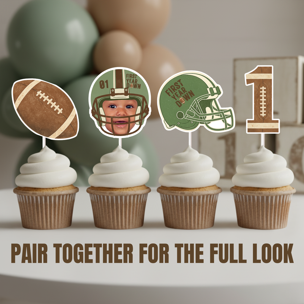 Close up of football first birthday cupcake toppers including personalized baby helmet face, football graphics, green helmet, and number one design. Coordinating First Year Down banner and cupcake decoration set for sports themed first birthday party. Image text reads, "Pair together or the full look" letting the viewer know that this shop also carries a full arrangement of Football First birthday decorations including multiple cupcake topper options. 