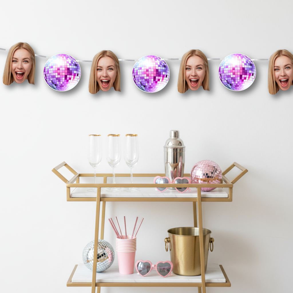 Bar cart with disco balls and faces on a white wall