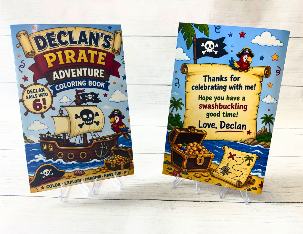 Two pirate-themed coloring book covers displayed upright on clear stands against a white wood background. The left cover reads 'Declan's Pirate Adventure Coloring Book' and shows a pirate ship, treasure, and a pirate character.