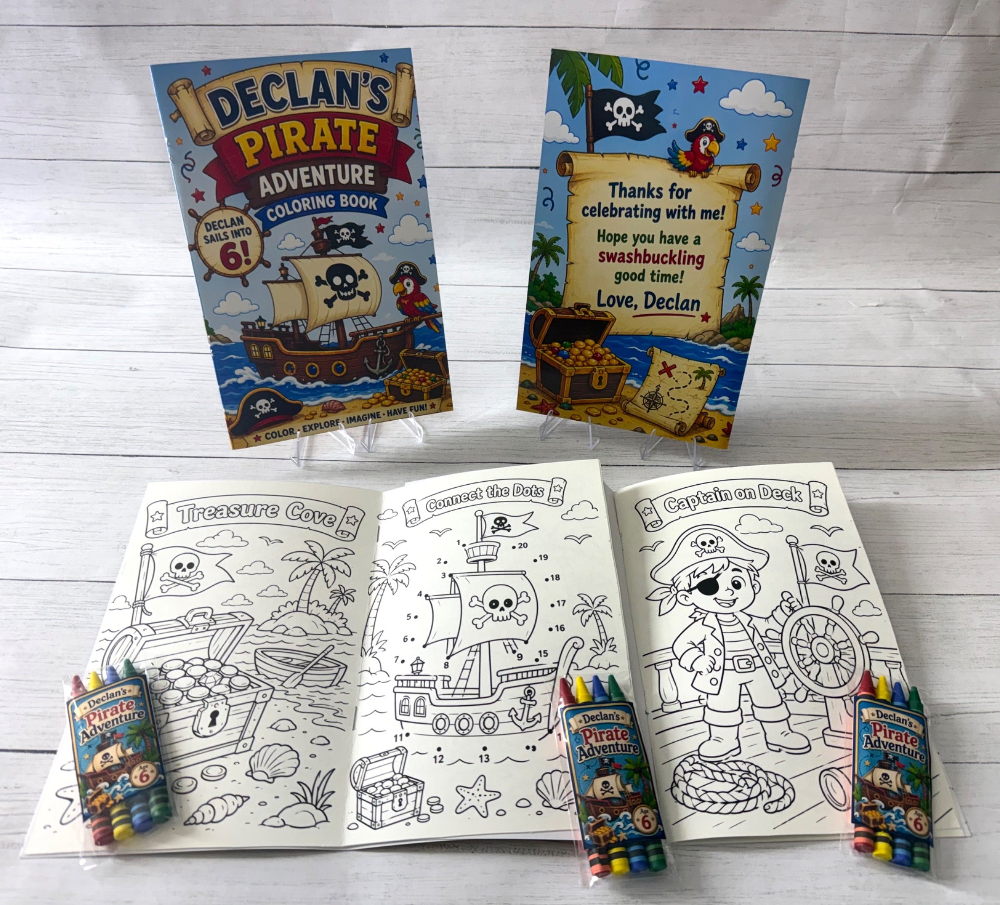 Personalized pirate birthday coloring book with custom coloring pages, activity pages and matching crayon packs.