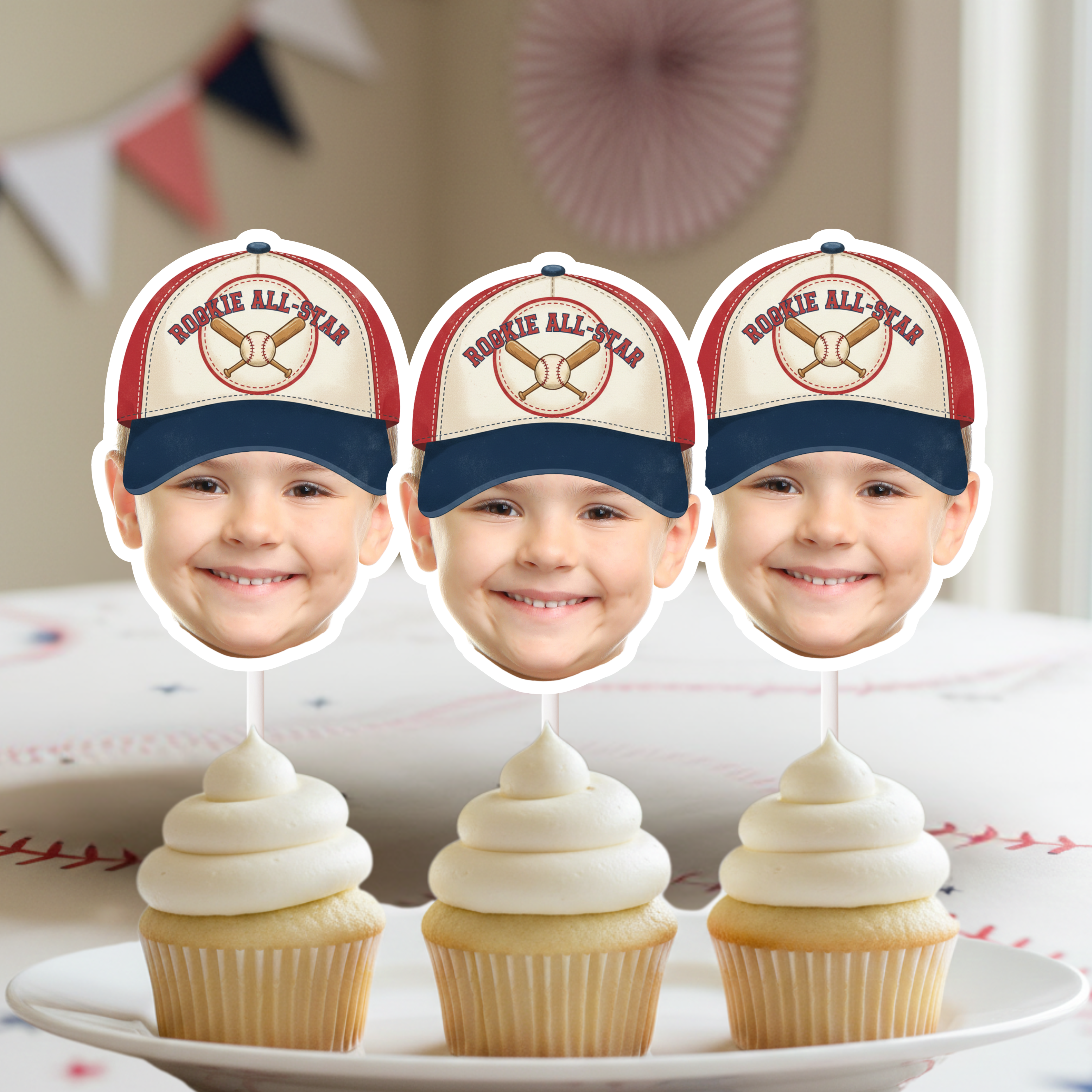 Personalized Vintage Rookie All-Star Baseball Cupcake Toppers in classic red white and blue displayed on frosted cupcakes for baseball first birthday smash cake and all American party theme.
