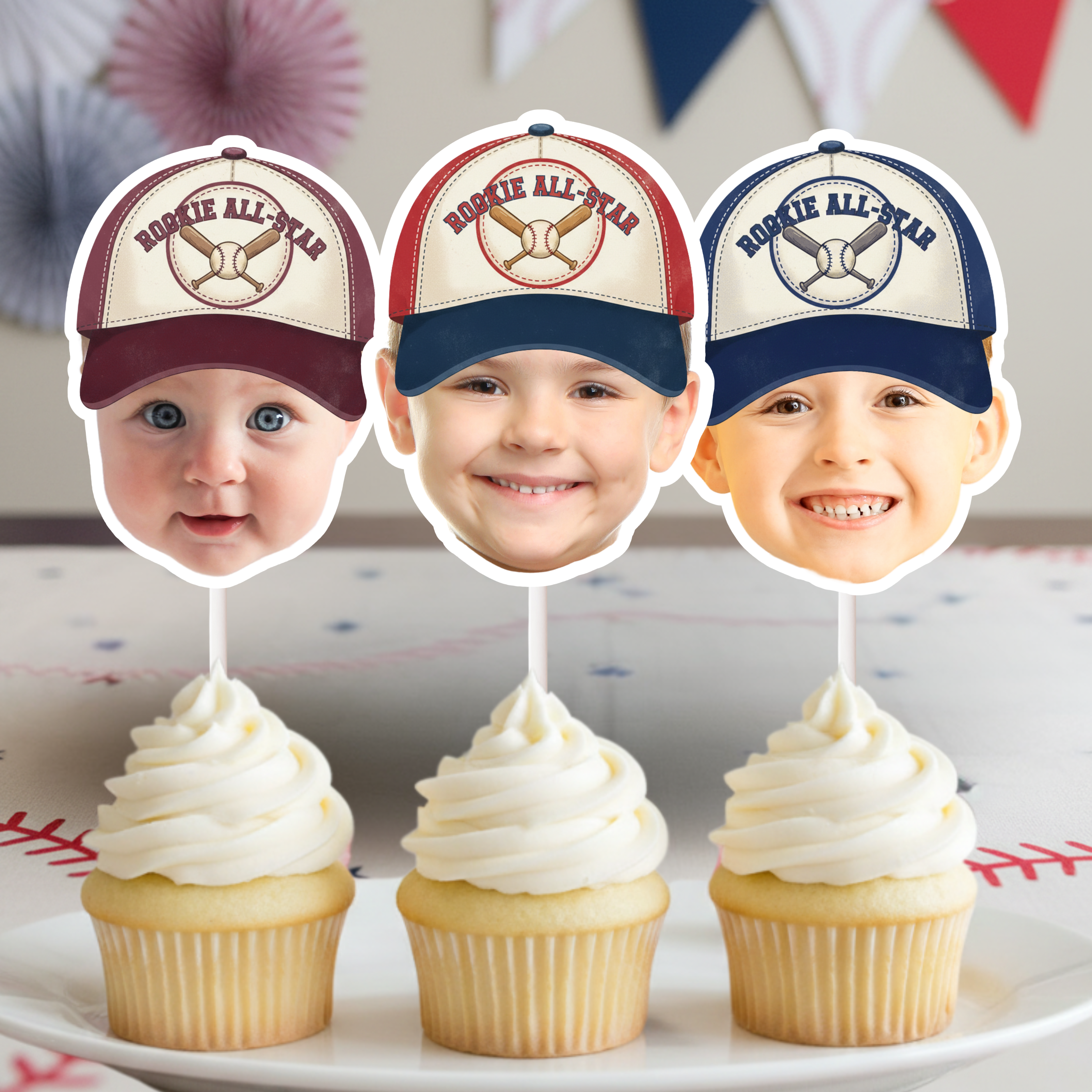 Photo Baseball Rookie All American Cupcake Toppers featuring maroon red and navy vintage Rookie All-Star cap designs displayed on vanilla cupcakes for baseball first birthday party decorations.