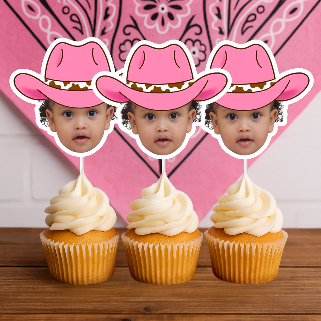 Personalized pink cowgirl hat photo cupcake toppers styled in front of a pink western bandana backdrop. Custom face cupcake decorations ideal for My First Rodeo birthdays, cowgirl core toddler parties, pony birthdays, and pink rodeo themed dessert tables. A bold western party accessory perfect for baby girl celebrations, country themed birthdays, and coordinated cowgirl party decor.