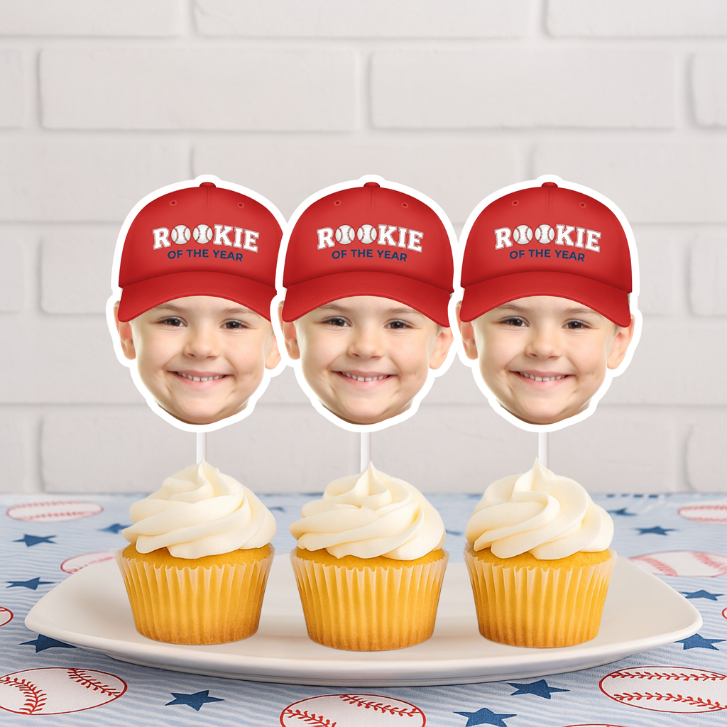 Three personalized Rookie of the Year baseball photo cupcake toppers with red caps displayed on vanilla cupcakes, perfect for a baseball first birthday party, little slugger celebration, and sports themed dessert table decorations.