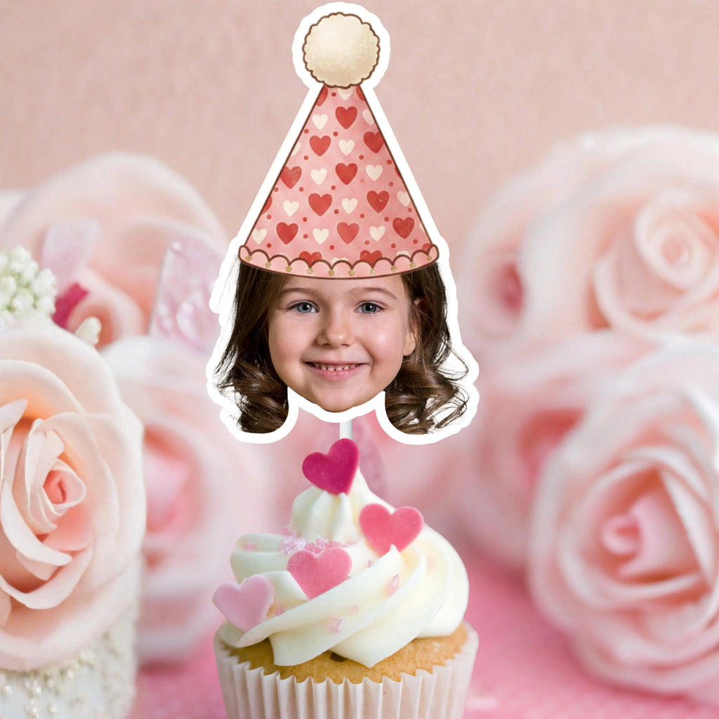 Valentine’s Day personalized photo cupcake toppers featuring a festive red and pink heart party hat displayed on red velvet cupcakes with heart accents. Custom love themed cupcake decorations ideal for engagement parties, February birthday celebrations, classroom Valentine treats, and romantic dessert tables.